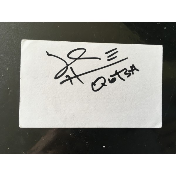Josh Homme ( Queens of the Stone Age) signature on album page with QOTSA underneath